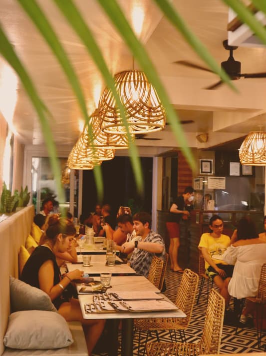 Guests dining at a Muchos Boracay group event